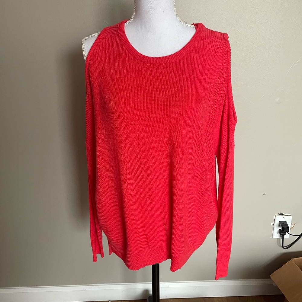 Red cold shoulder sweater.